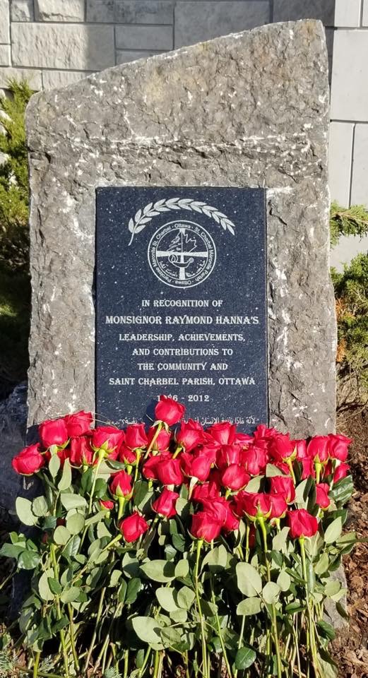 Plaque honoring Monsignor Raymond Hanna at Saint Charbel Parish.